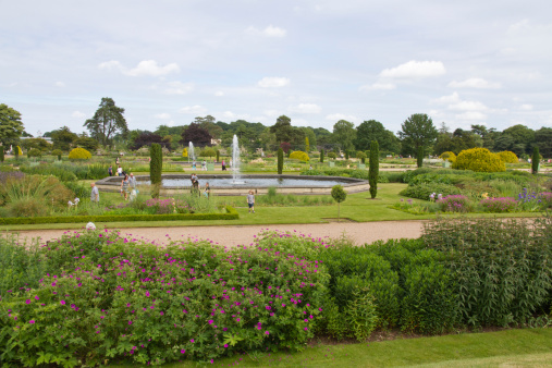 Stoke on Trent, Staffordshire, UK - June 29th, 2013: People spend a summers day in the  renovated Italian gardens at Trentham, Stoke on Trent.