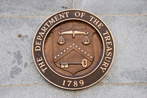 Washington DC, USA - April 10, 2008: The seal of the Department of the Treasury on the outer wall of the Treasury building in Washington DC