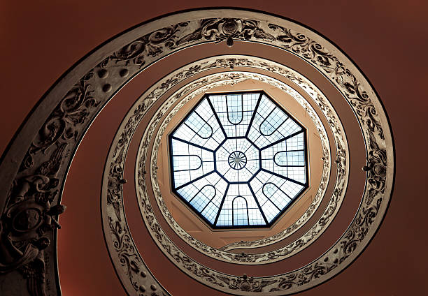 Rome, Italy - 11 September, 2010: Bottom view of ornate spiral staircase in the the Vatican Museum.