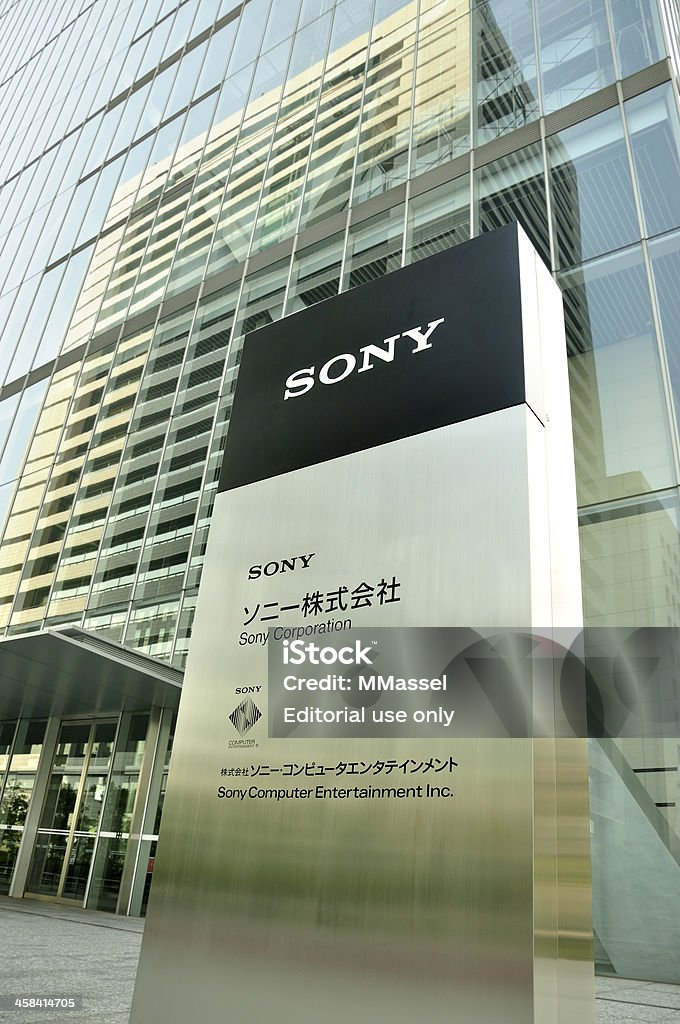 Sony Office Plaque Shinagawa, Tokyo, Japan - May 20, 2011: Sony plaque infront of their technology building at Shinagawa Technology Center, Shinagawa INTERCITY C Tower, 2-15-3 Konan, Minato-ku, Tokyo. Home of Sony Computer Entertainment Inc. The Office block is shown behind. Business Stock Photo