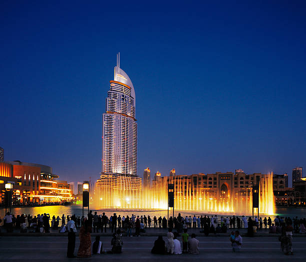 Dubai, UAE - July 3, 2013: The Dubai Fountain is Dubai's best attraction, with 6600 lights, 275 m long and shoots water up to 150 m into the air accompanied by a range of world music