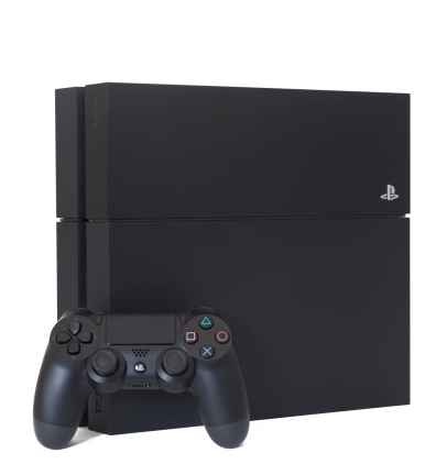 Las Vegas, USA - November 16, 2013: A photo of the PlayStation 4 video game system isolated on a white background. The PlayStation 4 or PS4 is a video game console from Sony Computer Entertainment and was launched on November 15, 2013 in North America.