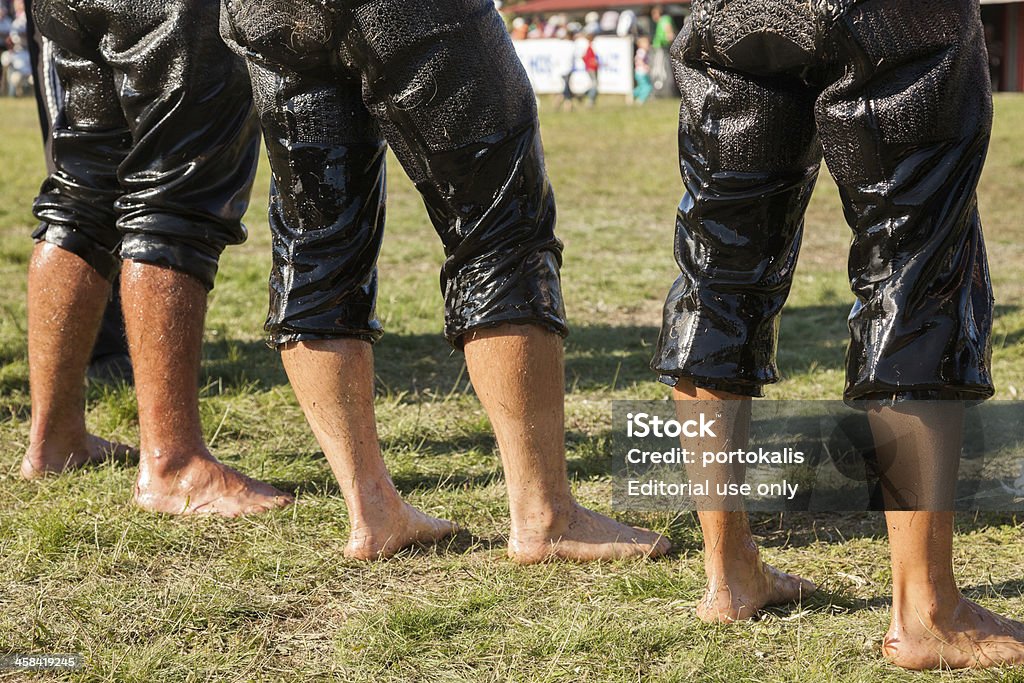 Annual meeting of Pomaks in Greece Hilia Evros, Greece - August 18, 2013: Unidentified wrestlers at the annual meeting of the Pomaks in Hilia location of all the villages in the area in Hilia Evros, Greece. Pomaks are a breed indigenous Adult Stock Photo