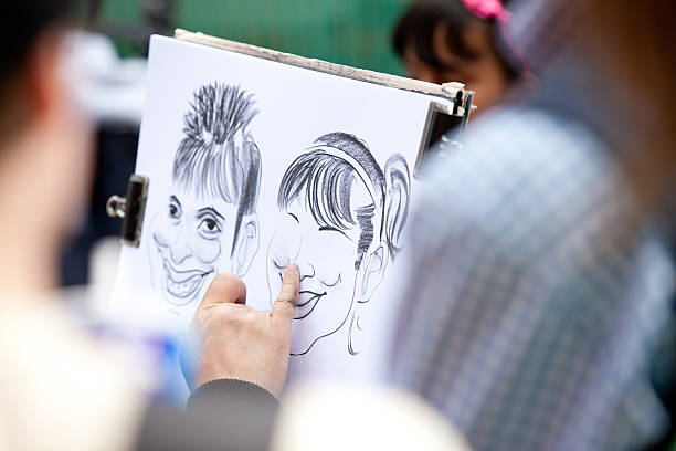 Caricature London City - Soho, United Kingdom - May 7, 2011: how to draw caricatures stock pictures, royalty-free photos & images