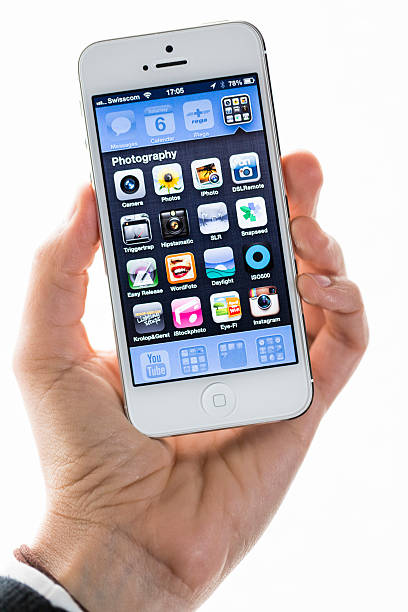 apple iphone 5, фотографирование папку - swisscom стоковые фото и изображения
