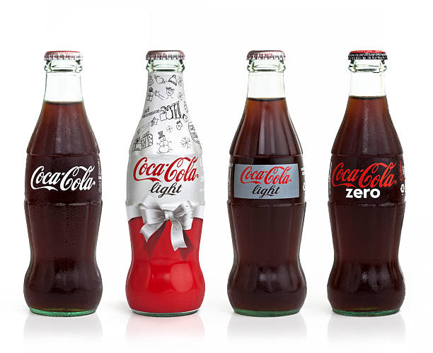 The product range of coca cola Istanbul, Turkey - March 25, 2011: The product range of coca cola on white background. coke zero photos stock pictures, royalty-free photos & images