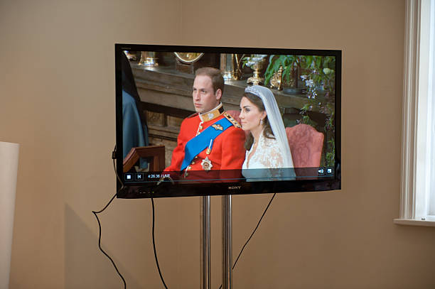 The Royal Wedding on Television in London, England Central London UK - April 29, 2011: A television broadcast of the royal wedding of Prince William and Kate Middleton. Photographed on the day of the wedding. princess of wales stock pictures, royalty-free photos & images