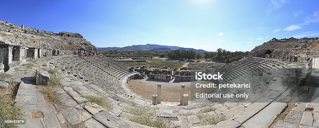 The Theater of Miletus - Panoramic Aydin, Turkey - September 22, 2013: People are visiting the  the theater of Miletus. The theater of Miletus was built in the 4th century B.C. after Alexander the Great defeated the Persians who controlled the city. Aegean Turkey Stock Photo