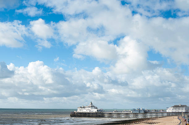 Eastbourne pier against a cloudy Summer sky, East Sussex, UK stock photo