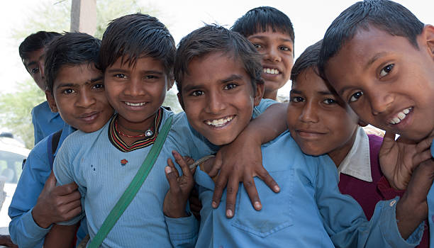Jaipur, India - March 16, 2011: Portrait from a  smiling and happy group of rural children in the surrounding from Jaipur in India.