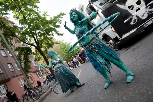 Berlin, Germany - May 23, 2010: Participants parading on the streets of Berlin during the Carnival of Cultures in 2010. Karneval der Kulturen is a four day street festival that takes place every year, celebrating the cultural and ethnic diversity of Berlin, with approximately 5200 participants and over a million visitors from all over the world.