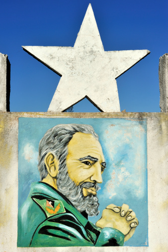 Playa Larga, Bay of Pigs, Cuba - December 29, 2010: A serene Fidel Castro painted on a monument loathing the Cuban revolution