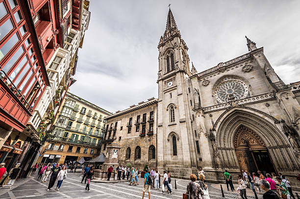 Bilbao, Spain - September 27, 2013: Tourists and citizens walking in front of the Cathedral of Santiago in Bilbao, Spain on September 27, 2013.