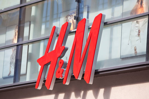 Logo of the Swedish retail-clothing company Hennes &amp; Mauritz (H&amp;M) stock photo