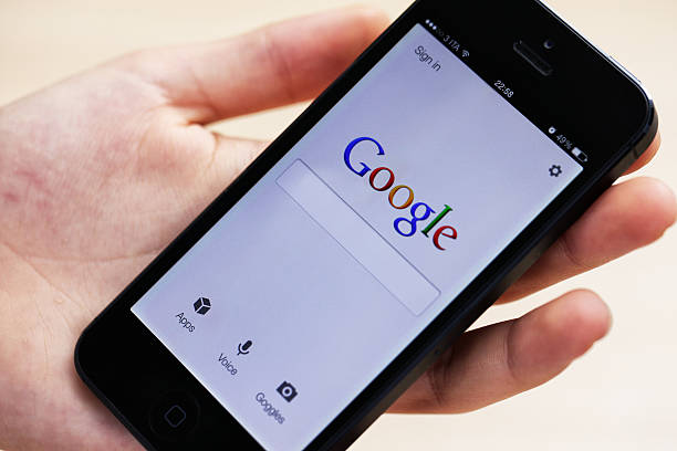 google on для iphone 5 - apple com стоковые фото и изображения