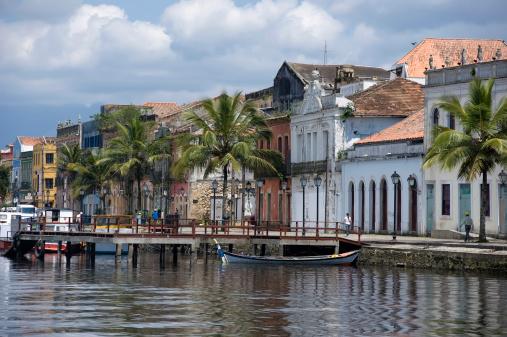 Paranagua, Brazil - October 20/2010: Houses in front of the wharf of the seaside town of Paranagua on the coast of Parana state.
