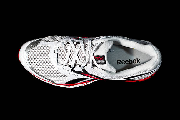 Reebok Premier Verone Supreme Running Shoe Toronto, Canada - April 20, 2011: Latest Reebok running shoe featuring current technologies DMX Shear, PlayDry and Kenetic Fit. Reebok is a subsidiary of Adidas and a distributor of its own branded sporting products. reebok stock pictures, royalty-free photos & images