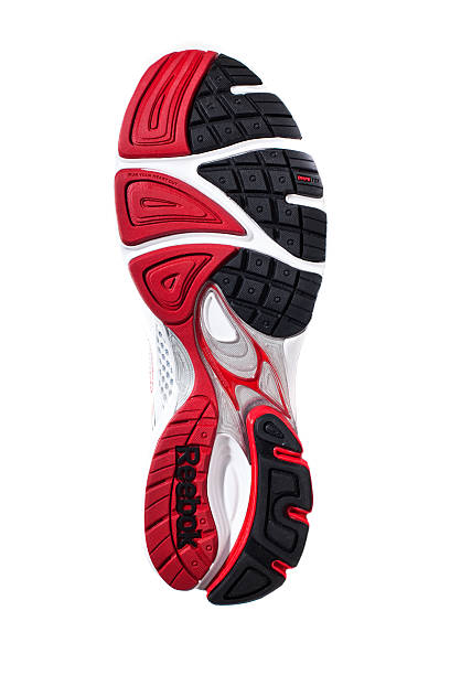 Reebok Premier Verone Supreme Running Shoe Toronto, Canada - April 20, 2011: Latest Reebok running shoe featuring current technologies DMX Shear, PlayDry and Kenetic Fit. Reebok is a subsidiary of Adidas and a distributor of its own branded sporting products. reebok stock pictures, royalty-free photos & images