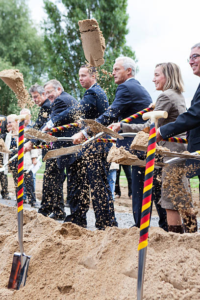 Groundbreaking ceremony - German Autobahn A 643 Wiesbaden, Germany - September 11, 2013: Florian Rentsch (FDP), Hessian minister for Economics, Transport and Regional Development, Peter Ramsauer (CSU), German Federal Minister of Transport, Building and Urban Development, Kristina Schroeder (CDU), German Federal Minister of Family Affairs, Senior Citizens, Women and Youth and Roger Lewentz (SPD), Rhineland-Palatinate minister for the Interior and infrastructure during the groundbreaking ceremony for expansion and new construction of German Autobahn A 643 between Wiesbaden and Mainz. The completion of building operations for the new bridge and highway is scheduled for 2019. german free democratic party photos stock pictures, royalty-free photos & images