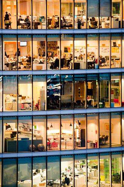 People working in a modern office building stock photo