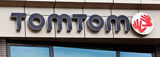 Logotipo de TomTom NV - fotografia de stock