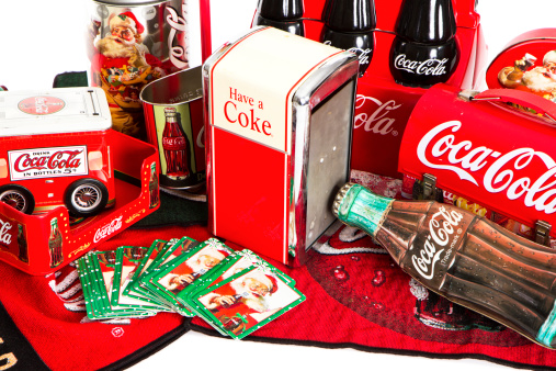 Chatham, Ontario, Canada - July 22, 2011: Assorted Coca-Cola Collectors Products. An assortment of new and vintage Coca-Cola products manufactured fro the retail industry for collectors of Coca-Cola memorabilia. Coca-Cola, commonly referred to as 