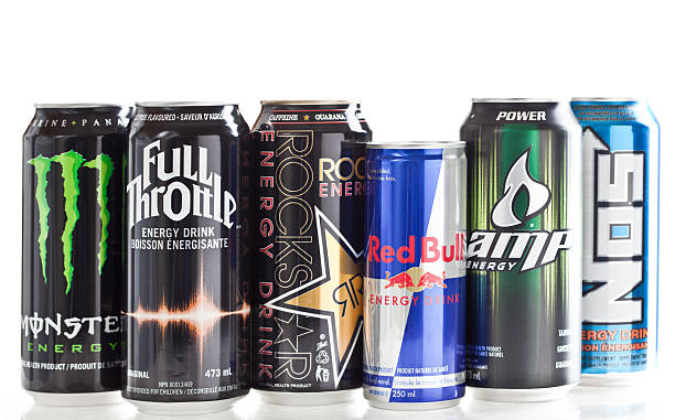 Various Energy Drink Brands Calgary, Alberta, Canada - March 26, 2011. Product shot of various energy drink brands. Group of energy drink brands: Amp, NOS, Red Bull, Rockstar, Full Throttle and Monster. energy drink photos stock pictures, royalty-free photos & images