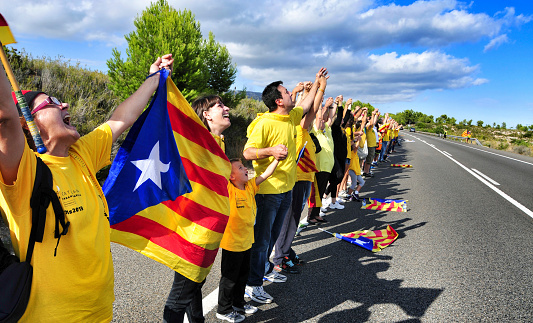 Ametlla de Mar, Spain - September 11, 2013 : Partakers in the Catalan Way  in Ametlla, Spain. 1,6 million people took part in the human chain supporting the independence of Catalonia