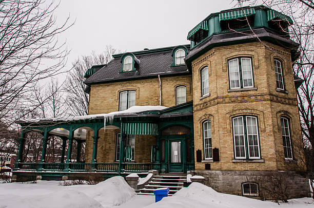 Laurier House National Historic Site Ottawa, Canada - February 23, 2013: Laurier House National Historic Site, a museum dedicated to Prime Ministers Sir Wilfrid Laurier and the William Lyon Mackenzie King, in winter on Laurier Street in Ottawa Ontario wilfrid laurier stock pictures, royalty-free photos & images