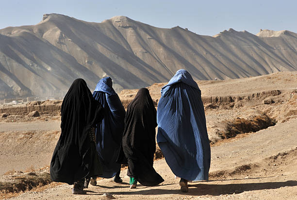 women in burqa, afghanistan - anständig klädsel bildbanksfoton och bilder