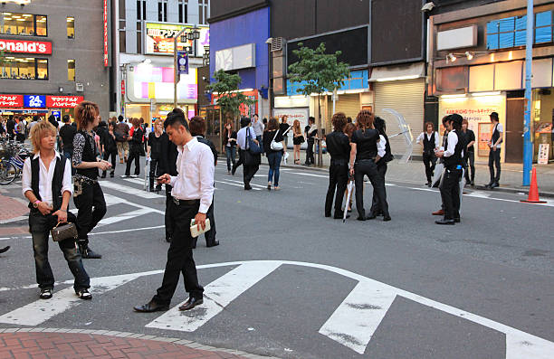 Male hosts looking for clients in Kabukicho, Japan stock photo