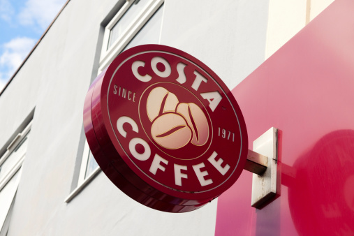 Beckenham, England - May 8, 2011: Projecting sign on a branch of the Costa Coffee chain of coffee shops, in Beckenham, Kent (South East London). Costa Coffee was set up in 1971 in Lambeth, south London, by brothers Sergio and Bruno Costa who supplied caterers and coffee shops from their coffee roastery. They expanded into retailing in 1978, opening their first shop in Vauxhall and the company (now owned by Whitbread) has around 1175 outlets in the UK.