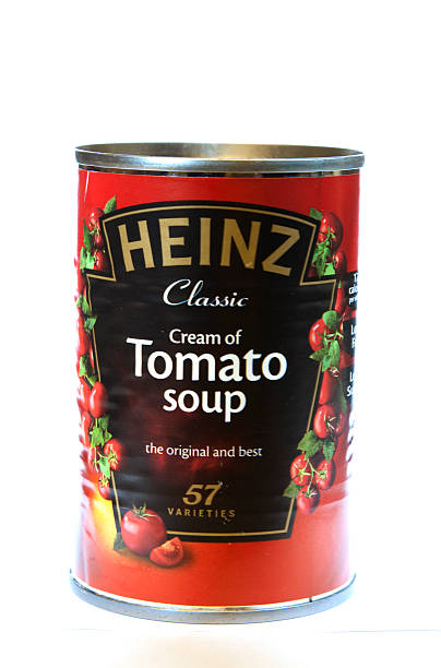Tin of Heinz Tomato Soup Glasgow, Scotland - February 10, 2011: A tin of Tomato Soup, manufactured by Heinz and isolated on a white background. Heinz Tomato Soup stock pictures, royalty-free photos & images