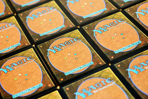 Liverpool, England - March 21, 2011: Magic: The Gathering collectible cards background, studio shot. Magic: The Gathering is a collectible card game introduced by Wizards of the Coast in 1993.