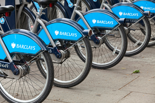 London, England - May 7, 2011:  A row of Barclays bicycles for rent on a sidewalk.