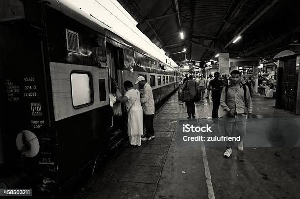 Embarking The Train In India Stock Photo - Download Image Now - New Delhi, Railroad Station, Senior Adult