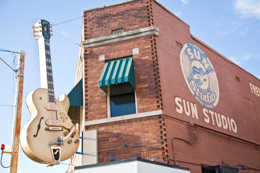 Memphis,  Tennessee, USA -12th October 2010:Giant Gibson guitar sign, with Bigsby vibrato, outside the Sun Studio, made famous as the recording studio of such megastars as Elvis Presley, Johnny Cash, Carl Perkins, Roy Orbison, Jerry Lee Lewis and many others.