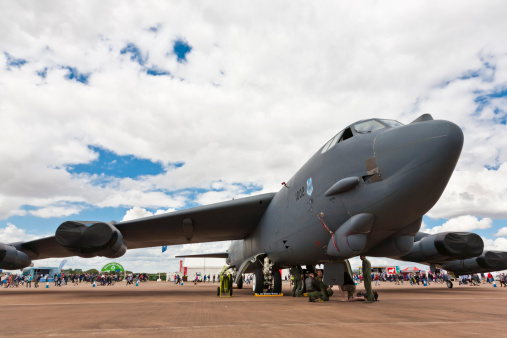Fairford, UK - July, 17, 2010: US military personnel attending a Boeing B-52 Stratofortress at the Fairford Royal International Air Tatoo. The B-52 is a long-range, subsonic, jet-powered strategic bomber designed and built by Boeing and operated by the United States Air Force (USAF).