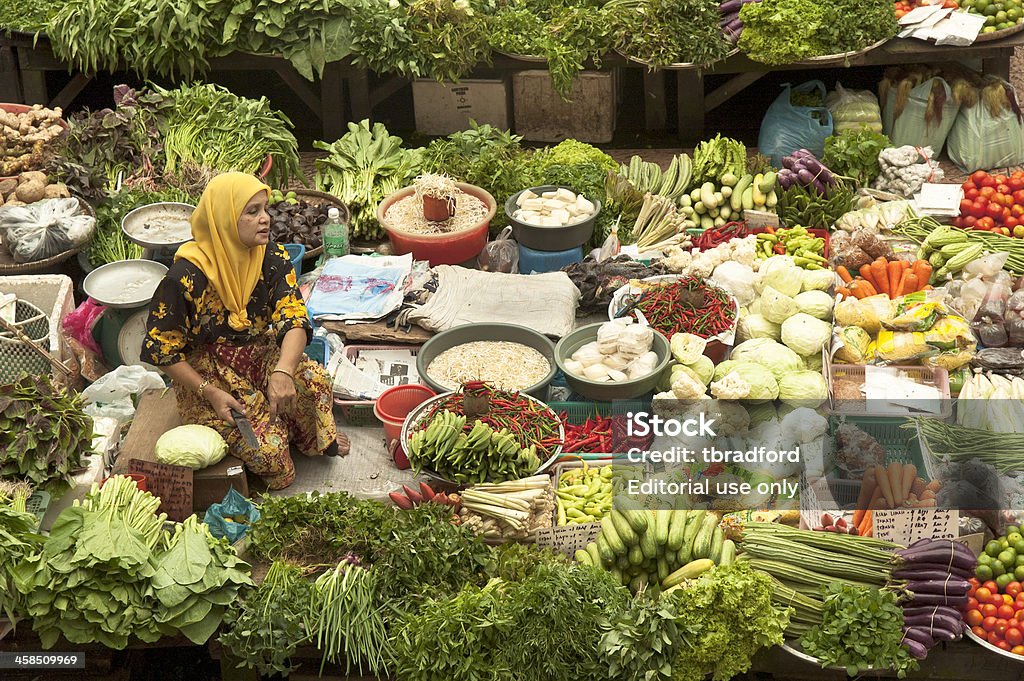 Feirante em Kota Bharu - Foto de stock de Mercado - Espaço de Venda no Varejo royalty-free