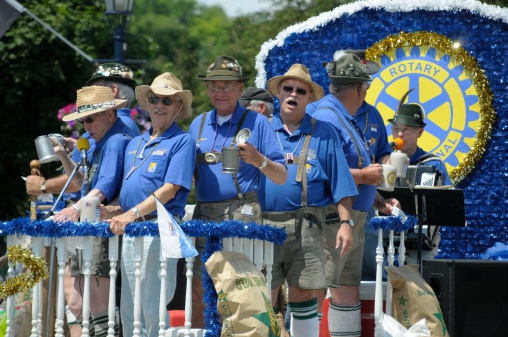 Frankenmuth, Michigan, USA - June 14, 2009: Members of the local Rotary Club dressed up in traditional Bavarian costumes having a good time during a festival in Frankenmuth, Michigan.