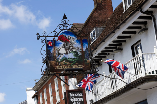 Westerham, England - June 3, 2011: Exterior of the George and Dragon public house at Westerham, in Kent, England. This is an ancient coaching inn in a busy little Kent market town just outside the outer suburbs of London. It is known that famous local people such as General James Wolfe, William Pitt the Younger and Sir Winston Churchill visited the inn. It was also popular with Battle of Britain crews during World War Two, being close to the RAF station at Biggin Hill.