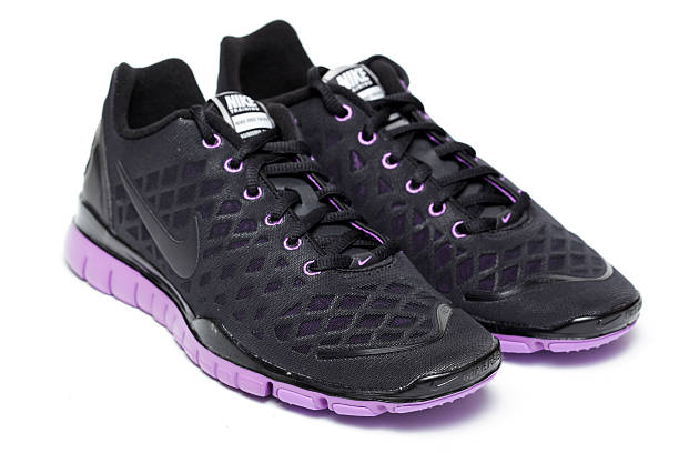 Womans Nike Free Tr Fit On White Stock Photo - Download Image Now - Nike Designer Label, Purple, Black Color iStock