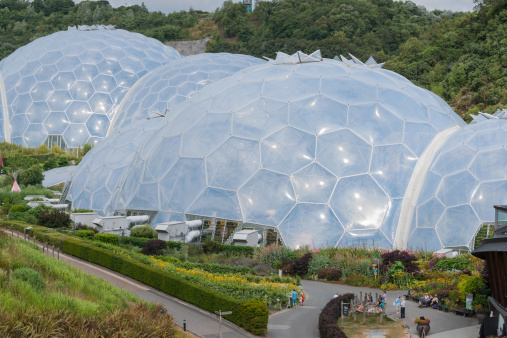 Cornwall, England - July 24, 2013: Eden Project large geodesic domes that house much of the horticultural exhibits. the project has plants from around the world.