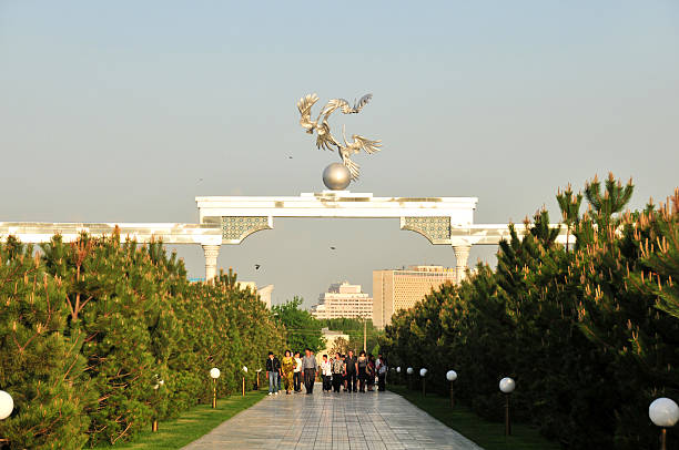 Tashkent, Uzbekistan - April 17th, 2011: The Ezgulik decorated archway (the arch of good and noble aspirations) adorned with sculptures of storks taking flight built at the entrance to the Independence Square in Tashkent.