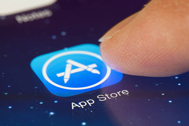 Clicking the App Store icon in iOS 7 stock photo