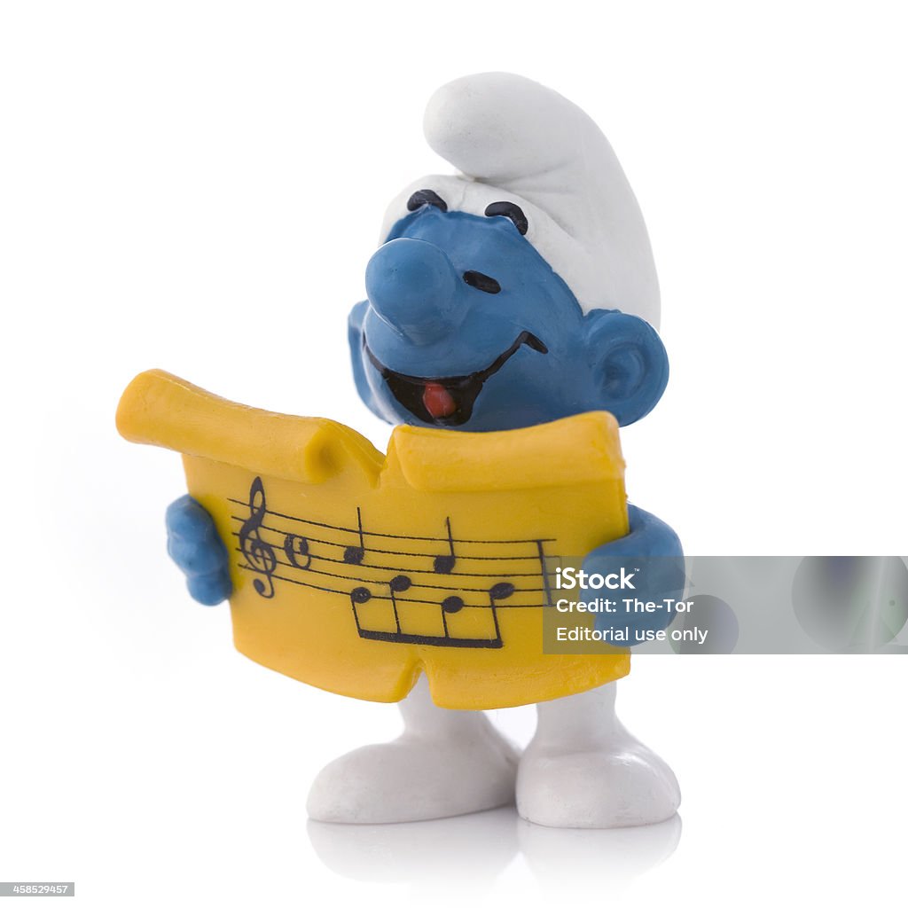 Smurf with song sheet Gothenburg, Sweden - February 12th, 2011: Smurf figure holding song sheet. Manufactured by Schleich GmbH. Arts Culture and Entertainment Stock Photo