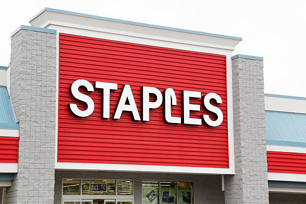 Staples Retail Store Logo Sign - Horizontal Penfield, New York, USA - May 1, 2011: A recently opened Staples brand office supply retail store located in Penfield, NY. staple stock pictures, royalty-free photos & images