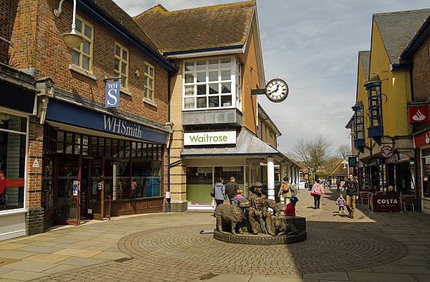 Petersfield town centre, Hampshire Petersfield, Englland - April 14, 2013:  Shoppers walking along a pedestrianised road in the town centre of Petersfield. petersfield stock pictures, royalty-free photos & images