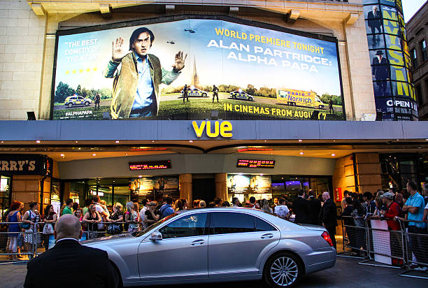 Alpha Papa movie premiere, London London, United Kingdom - July 24, 2013 : Entrance of the Vue cinema for the movie premier of Alpha Papa. A car and a body guard are waiting for the celebrities including Alan Partbridge to come out. leo tolstoy stock pictures, royalty-free photos & images