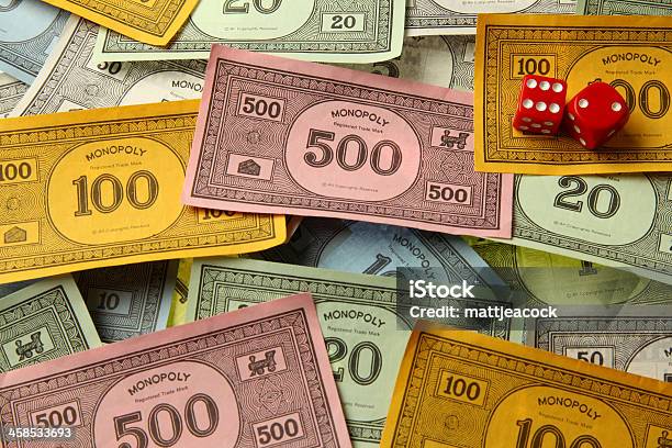 Monopoly Game Money With Dice Stock Photo - Download Image Now - Monopoly, Currency, Paper Currency